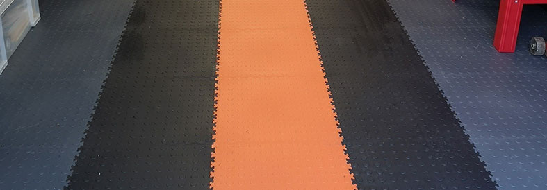 Grey shades and Orange Diamond Plate Temporary Floor Tiles